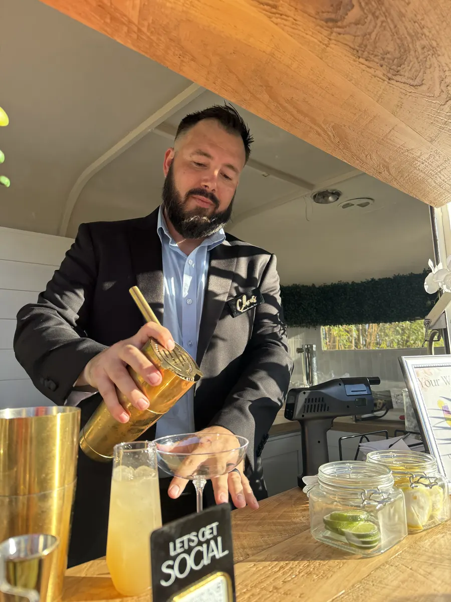Chris bartending at event